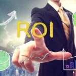 Businessman touching ROI (return on investment)