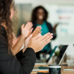 hands-clapping-at-meeting
